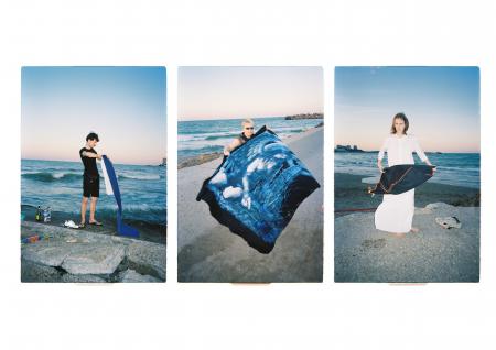  Folding towels at the beach 